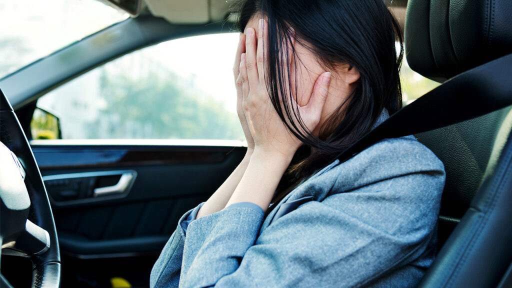 Car Accident victim upset in vehicle