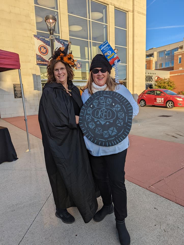 two women dressed in costumes at Rockin' Trick or Treat